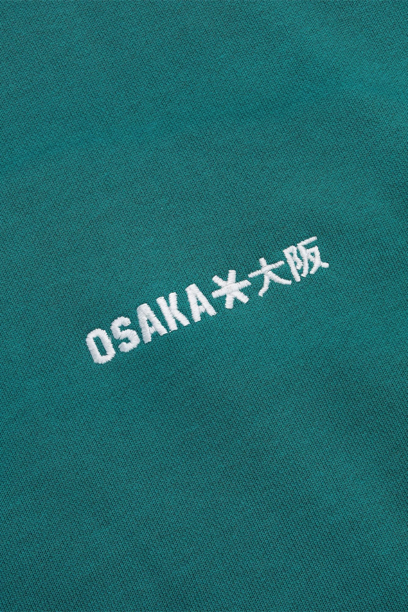 osaka-men-polo-sweater-transformative-teal image 4
