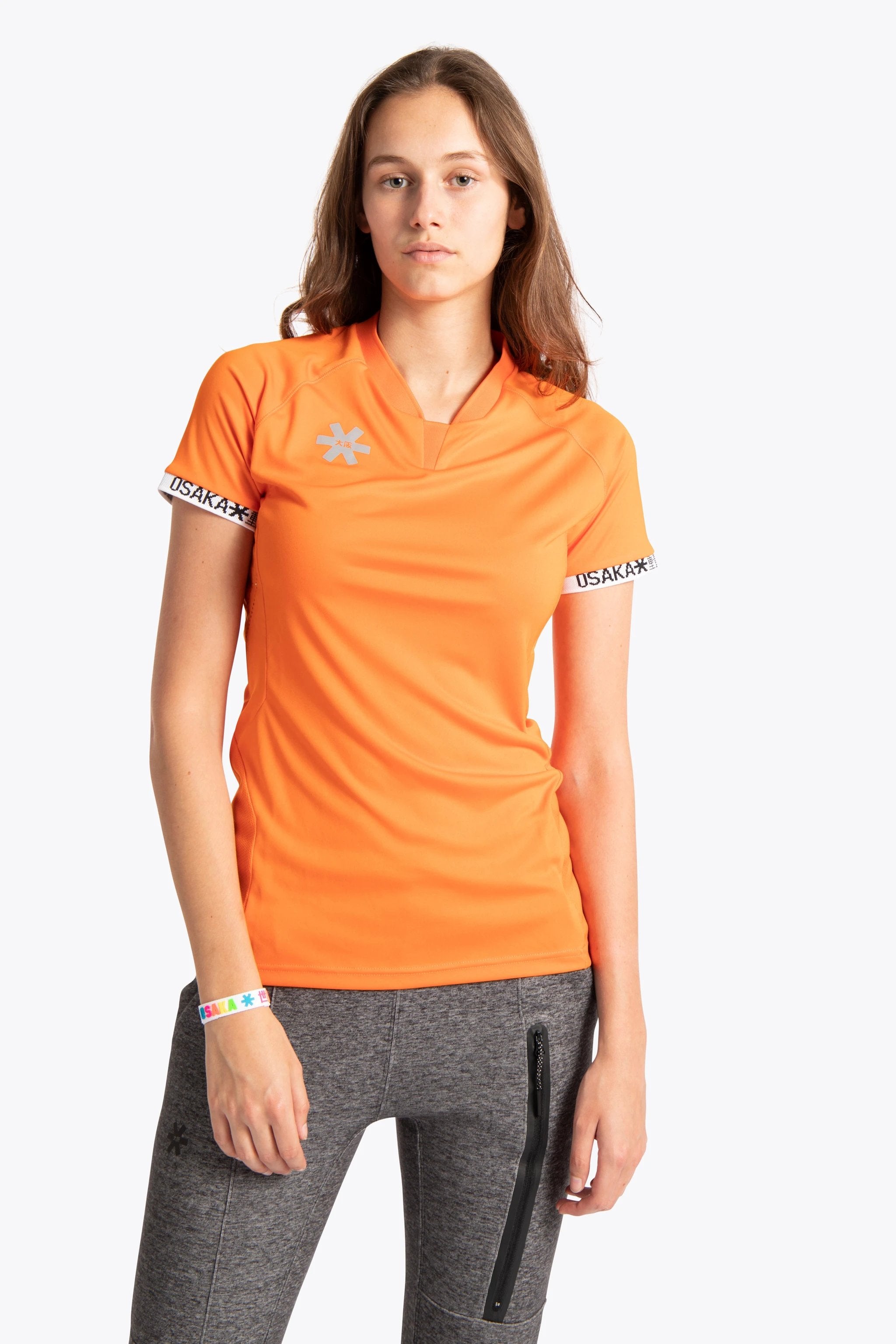 osaka-women-jersey-arancione-maglia-hockey-prato-donna image 2
